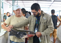 Ipaam orienta sobre pesca sustentável na Feira da Panair com entrega de fitas de medição